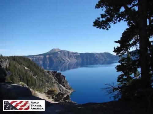 Still, blue waters, and blue skies, at Crater Lake National Park in Oregon