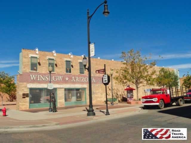 Standin on a Corner, in Winslow, Arizona, such a fine sight to see, on Route 66