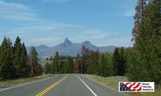 Beartooth Mountain in the distance, with the namesake chisel-shaped "bear's tooth" towering overhead