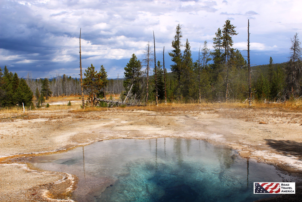 Brilliant, colorful hot water pool at Yellowstone National Park