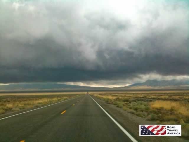 Storm clouds hanging over U.S. Route 50 in Nevada
