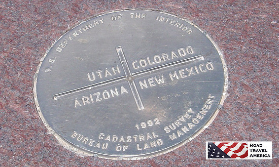 Four Corners Monument survey plaque marking the meeting point of Utah, Colorado, Arizona and New Mexico